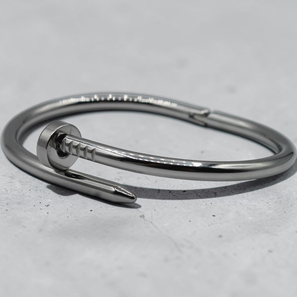 Nail-motif open cuff bracelet in silver